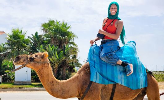 hssa-rabat-girl-on-camel-tongue-out
