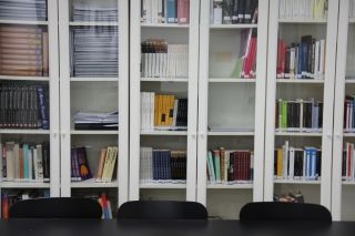 Books on a bookshelf in a classroom in Barcelona