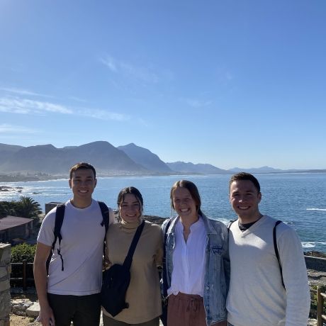 cape town students at cliff overlook sun