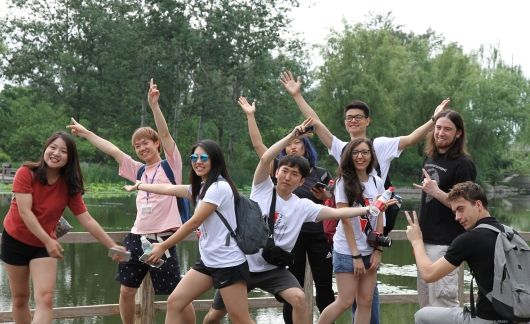 students pose together funny photo study abroad beijing