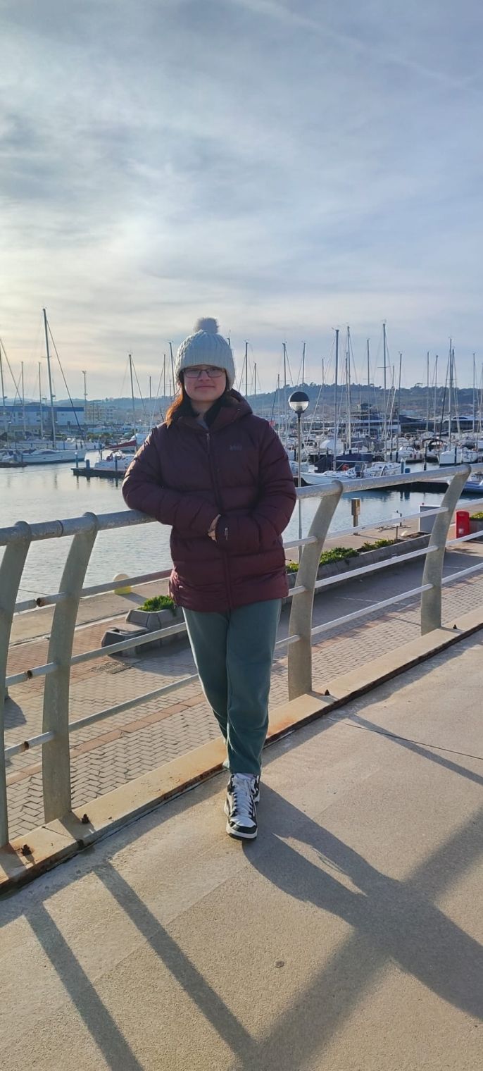 Photo of me in front of the boat dock in Fano.