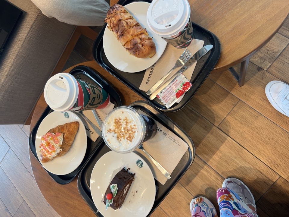 Picture of Starbucks drinks and food. 