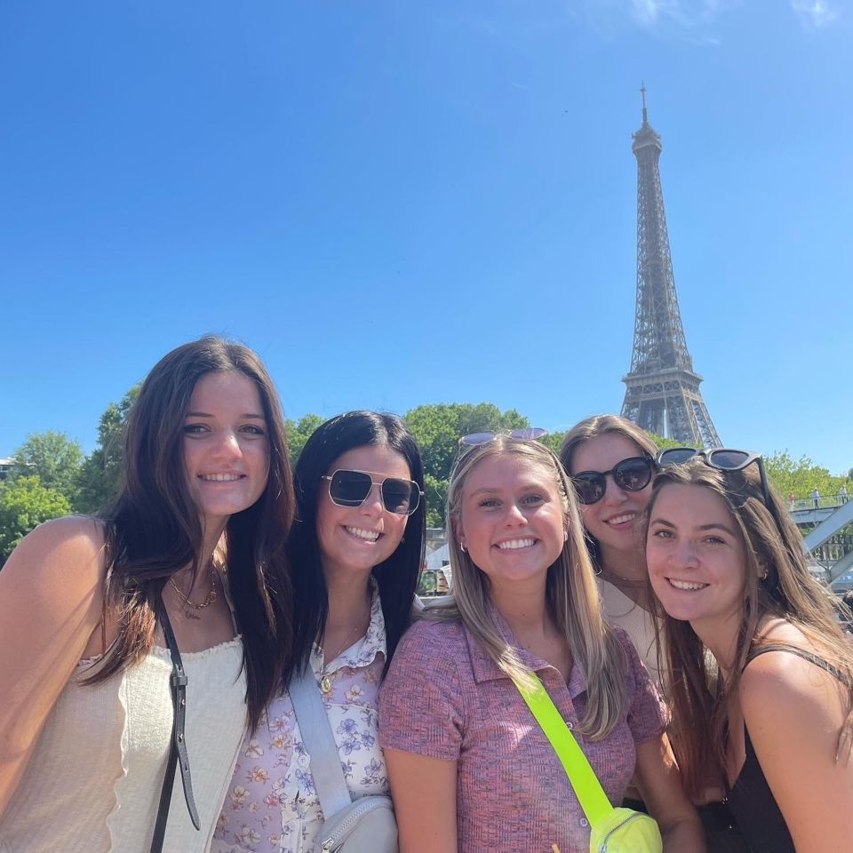 eiffel tower students smiling