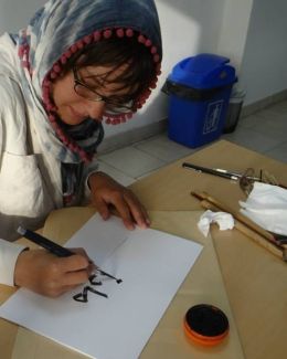 arabic student learning language calligraphy