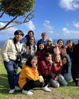 Group of high schoolers in Cape Town by the ocean