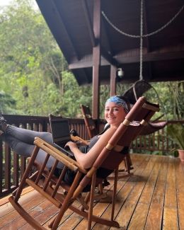 study abroad student in hammock porch