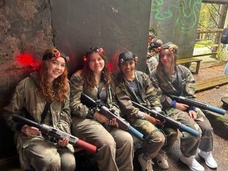 Four Global Entrepreneurship students ready to play laser tag!