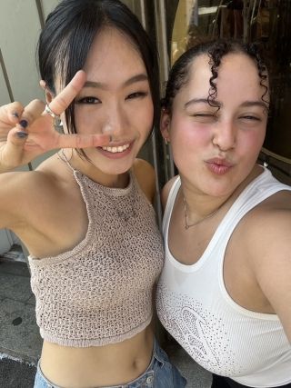 Perla and Hyemin posing