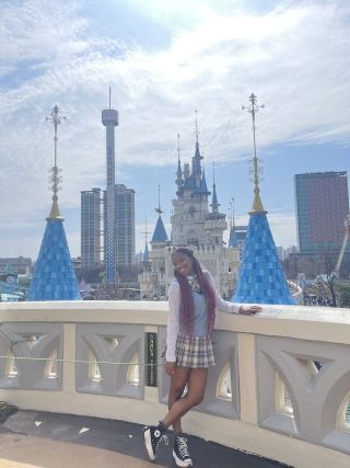 Photo of the author, Kristie, in front of Lotte Worlds iconic Castle