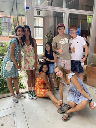 High school students posing by a door at a restaurant in Palma de Mallorca