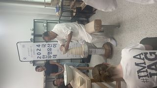 Kim Jeong-ok making pottery