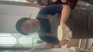 Friend creating ceramics