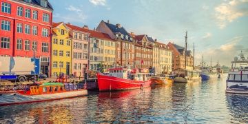 copenhagen canal with red boat