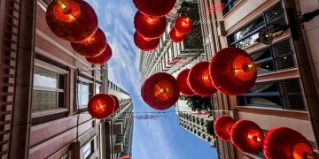 singapore lanterns in street from below