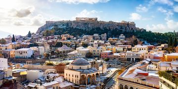 athens-snow-dusted-rooftops-acropolis-background
