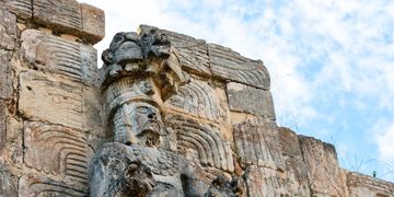 merida-mayan-ruins-stone-carving-statue
