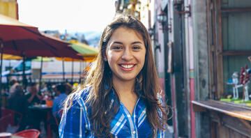 Young female student in city