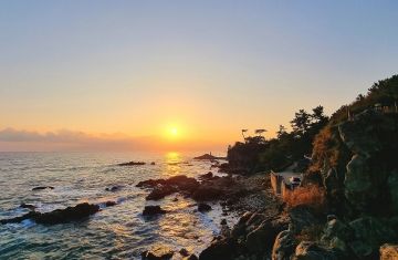sunrise in south korea over the ocean