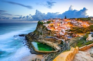 coast of lisbon portugal nighttime