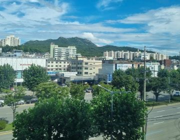 A view of the buildings and mountains in Pyeongchon from my hagwon window.