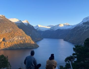 abroad students mountain lake overlook