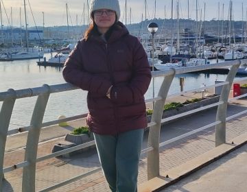 Photo of me in front of the boat dock in Fano.