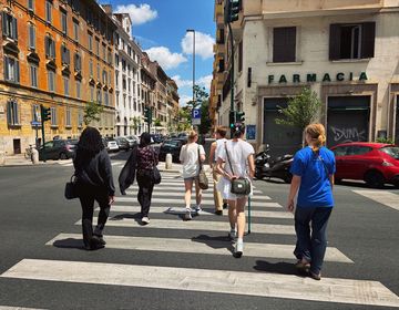 The early flyers met for a tour of the neighborhood, Prati!