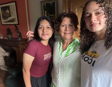 Yulisa and Emma with their host mother. 