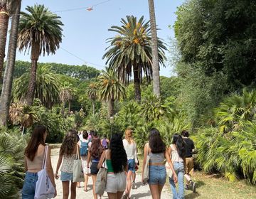 Students walking in the garden.
