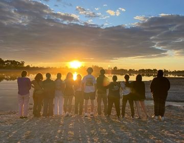 Enjoying sunset around the water in the Okavango delta.