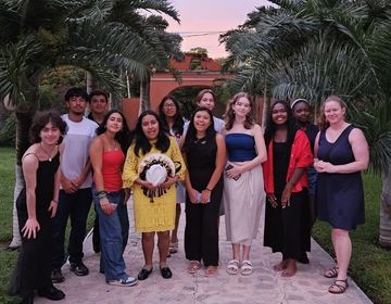 Students with their teacher Pilar.