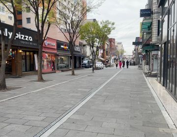 street view in pyeongtaek with building lined along it 