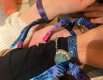 Friends wearing EDC Korea Day 2 wristbands