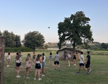 Students play volleyball in Florence Italy