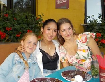 Jamie and her host siblings