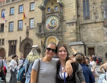 Two HSSA students next to the Astromical Clock