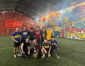 Global Navigators pose on the soccer pitch after an afternoon of scrimmaging.