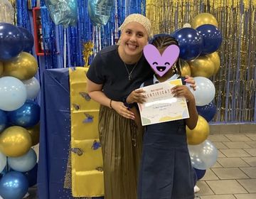 Emily with student