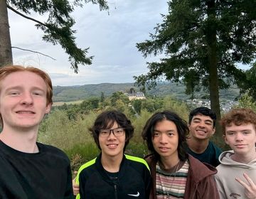 Dominick poses with some of his new friends in Germany.