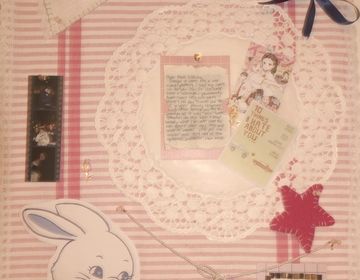 Hanna decorated a corkboard with pink fabric.
