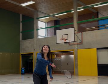Hanna tries her hand at friendly game of badminton.