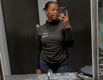 Naomi takes a selfie at work.