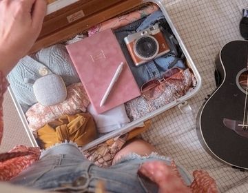Photo by Paige Cody. Photo of packed luggage.