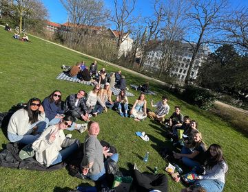 Enjoying the Danish sun with yummy cake and a game of kings game 