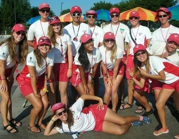 Lifeguards from a Six Flags park pose for a photo.