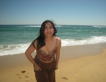 Another selfie in front of the beach