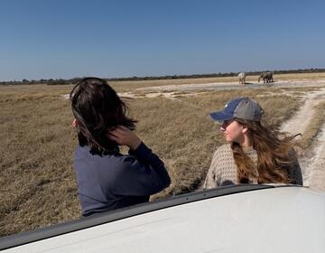 Two students enjoying the view at an excursion 