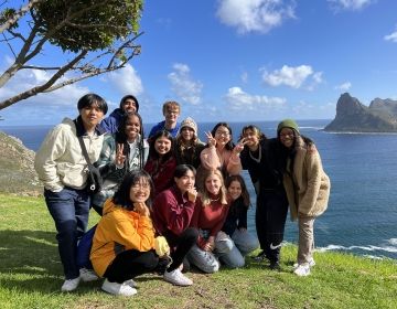 Group of high schoolers in Cape Town by the ocean