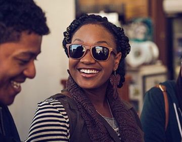 jorian reeves smiling sunglasses on abroad