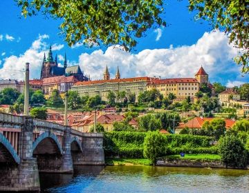 prague river bridge church hill